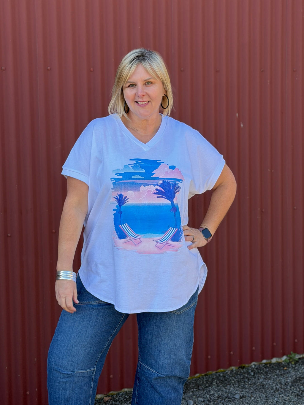 The Chasing Sunset Tee is made of soft 100% cotton with rib detail on the cross over V-neck. The dropped shoulder is finished with rib detail on the sleeves.  By Cashews Proudly made in New Zealand.