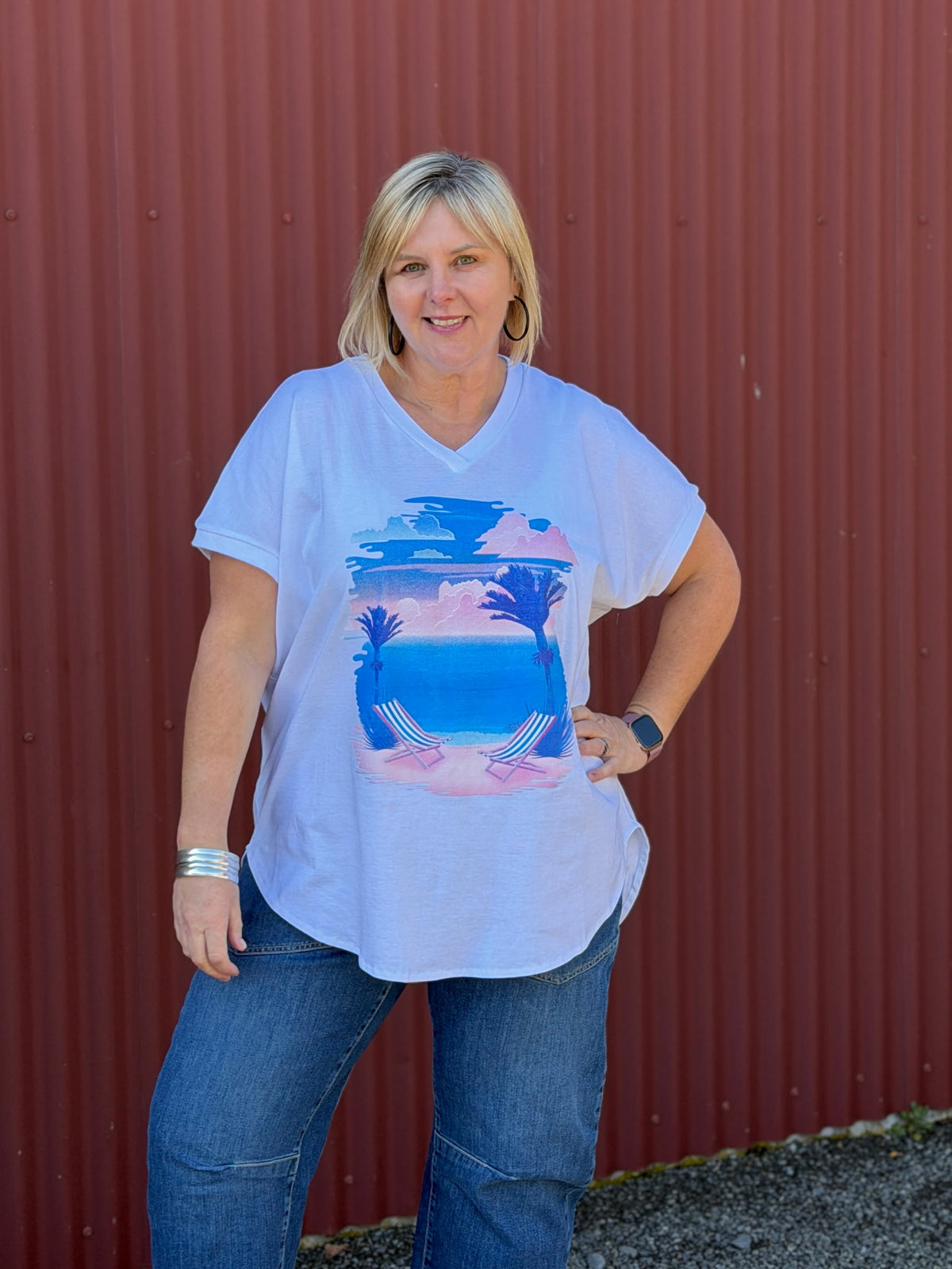 The Chasing Sunset Tee is made of soft 100% cotton with rib detail on the cross over V-neck. The dropped shoulder is finished with rib detail on the sleeves.  By Cashews Proudly made in New Zealand.