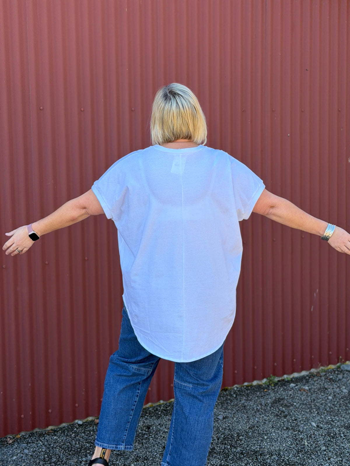 The Chasing Sunset Tee is made of soft 100% cotton with rib detail on the cross over V-neck. The dropped shoulder is finished with rib detail on the sleeves.  By Cashews Proudly made in New Zealand.