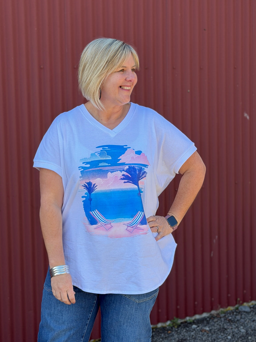 The Chasing Sunset Tee is made of soft 100% cotton with rib detail on the cross over V-neck. The dropped shoulder is finished with rib detail on the sleeves.  By Cashews Proudly made in New Zealand.