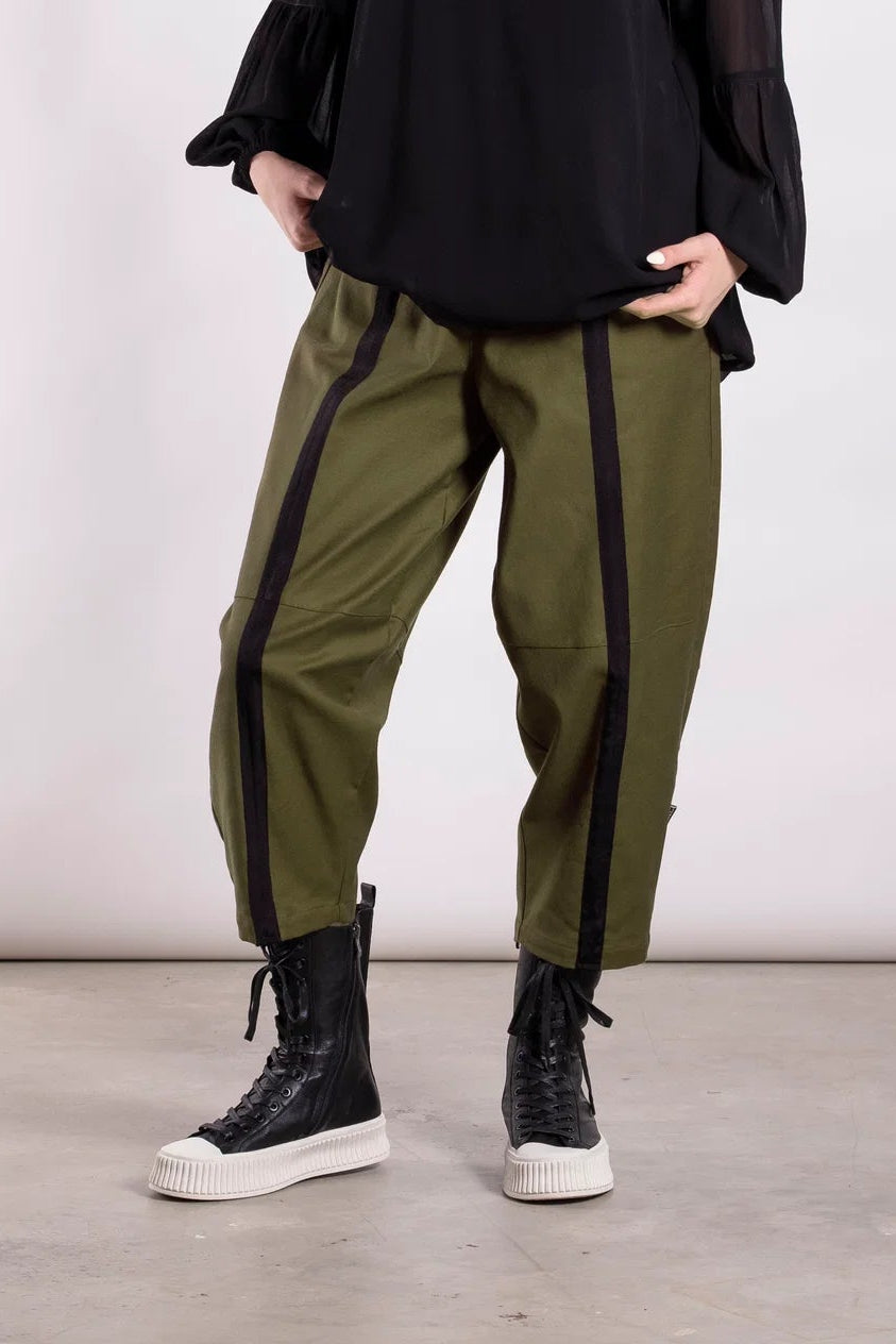  The Direction Pants feature contrast ribbon design lines running down the leg, creating length and definition while maintaining comfort and ease of movement.  By Deeanne Hobbs 