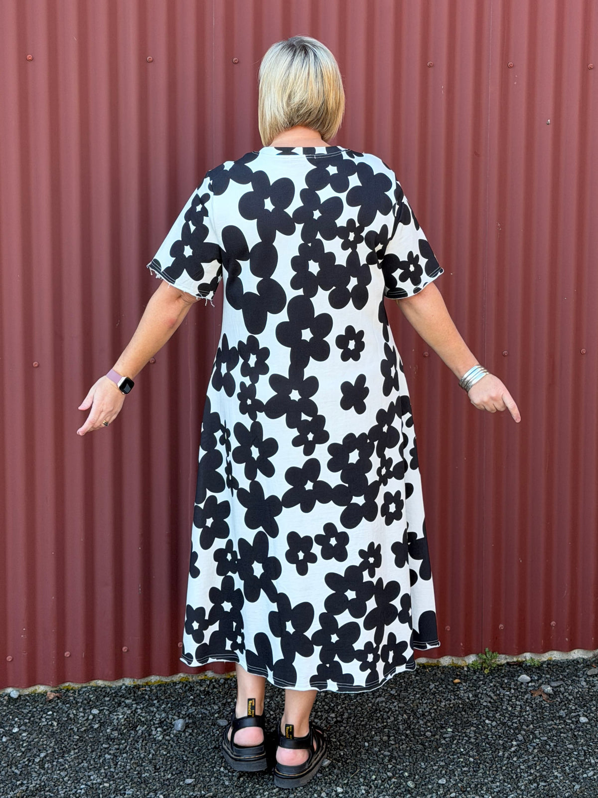 Relaxed and effortless with a softly flowing A-line silhouette.Architectural lines, inset pockets, drape that moves beautifully on the body. Deeanne Hobbs