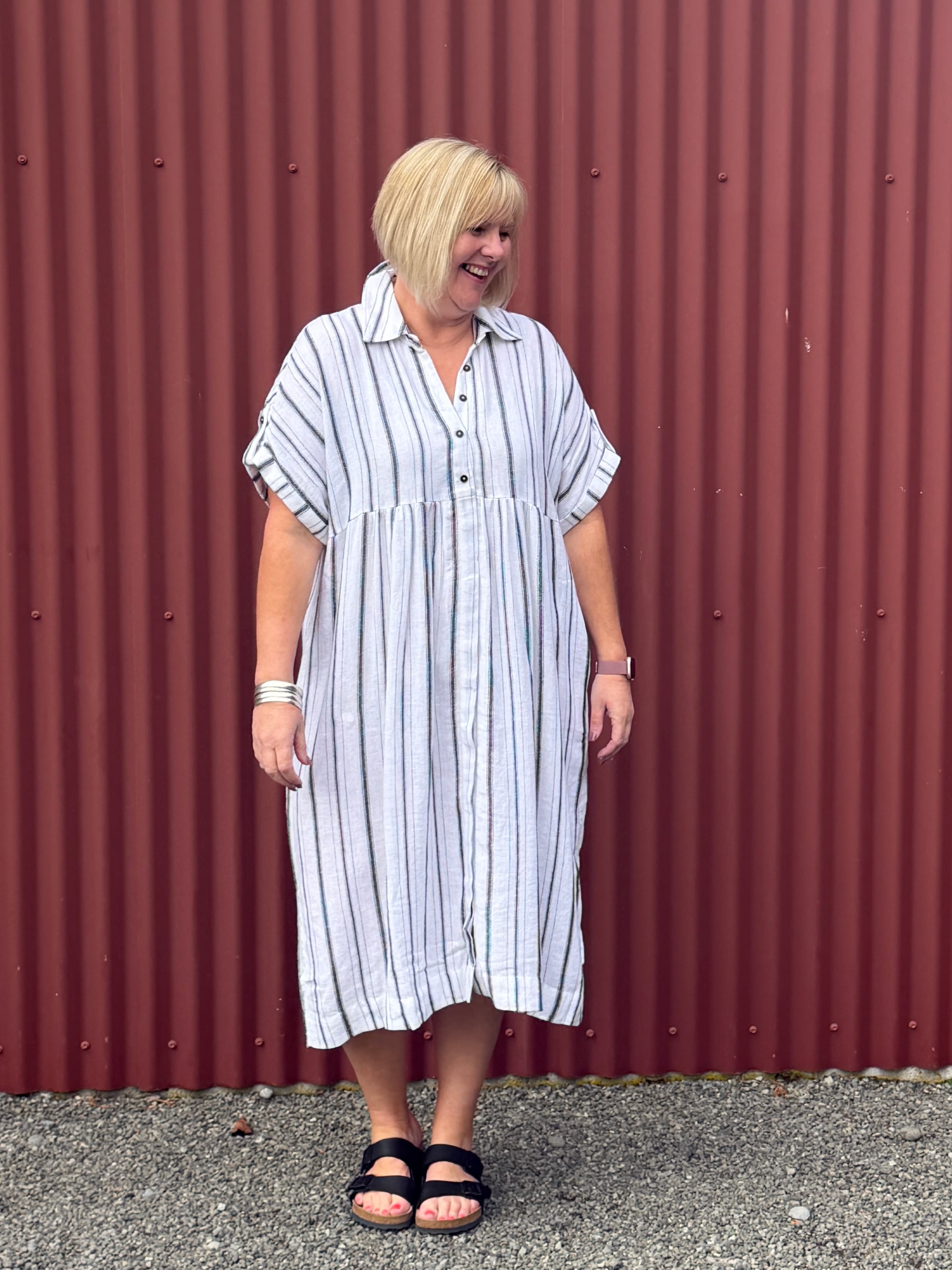 Tribal flowy yarn dye stripe shirt dress, offering the same airy linen-cotton blend, easy drape, and everyday comfort for all body types. Designed for effortless, confidence-boosting style wherever you go.

Fabric 55% Linen 45% Rayon