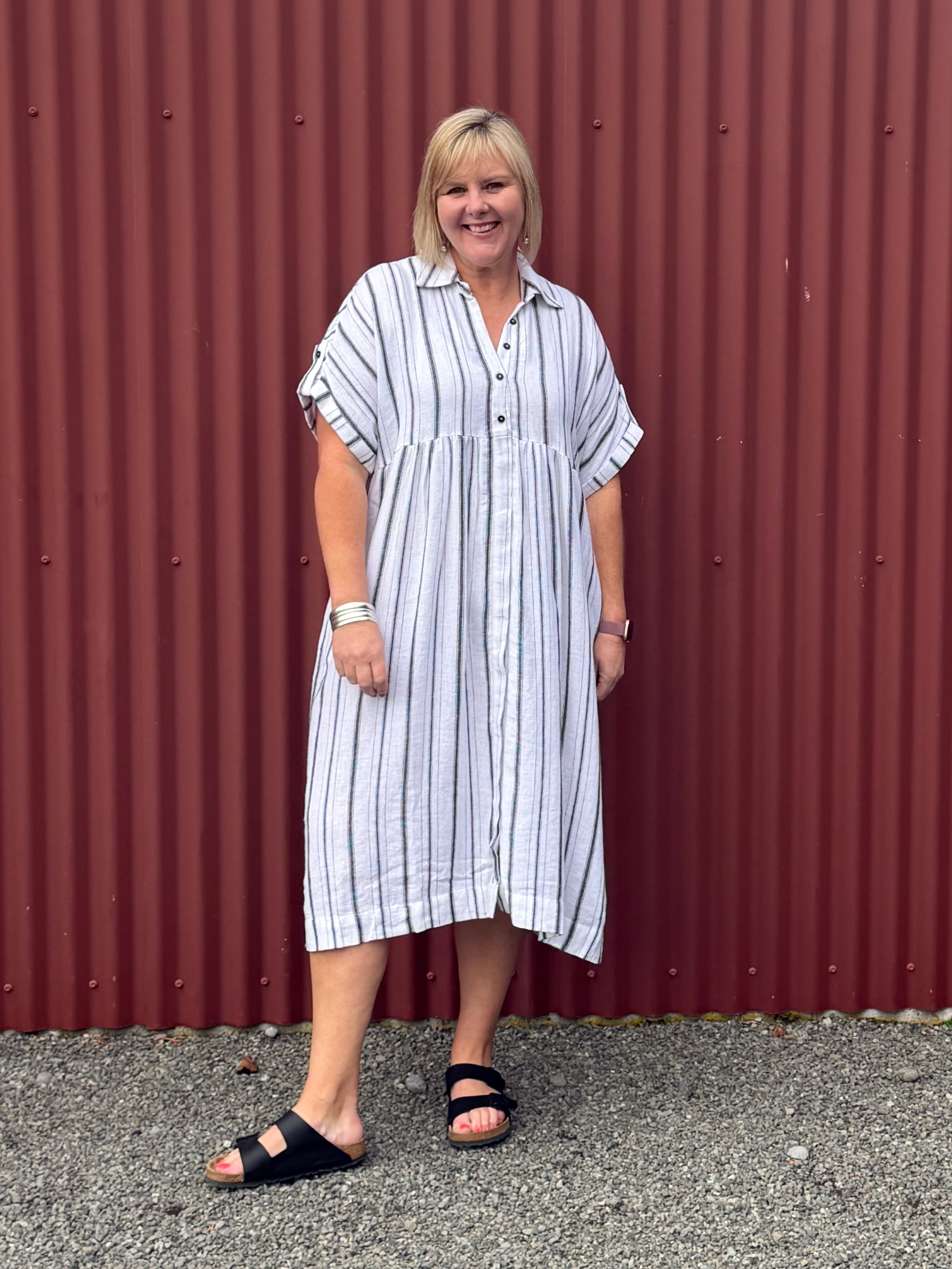 Tribal flowy yarn dye stripe shirt dress, offering the same airy linen-cotton blend, easy drape, and everyday comfort for all body types. Designed for effortless, confidence-boosting style wherever you go.

Fabric 55% Linen 45% Rayon