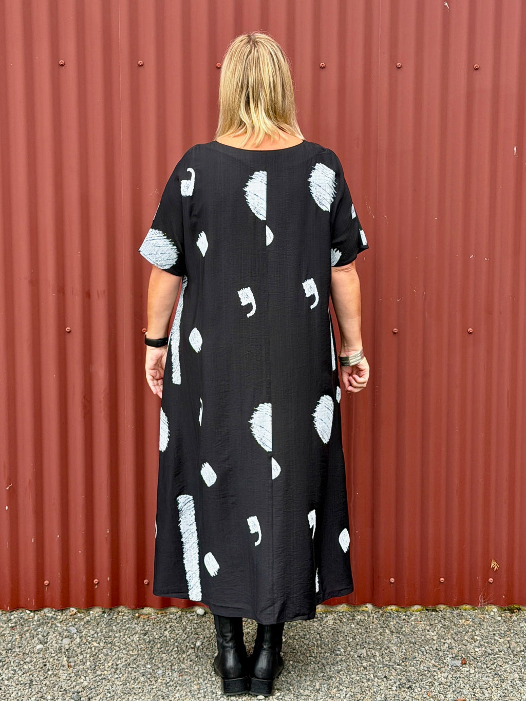 Crafted from a soft, breathable blend of 80% rayon and 20% nylon, it drapes beautifully over the body without clinging. The fabric has a lovely fluid movement