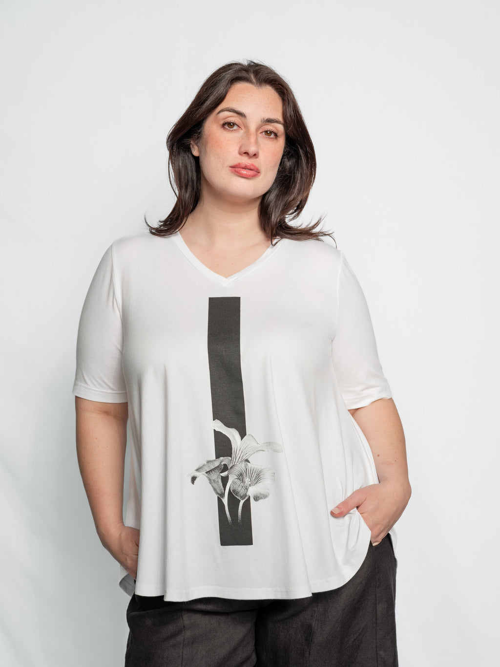 The Lilly Luxe Top has an exclusive print , Lilly with a feature stripe. Its is fitted near the top and then flares out at the bottom. 100% viscose By Cashews Proudly made in NZ