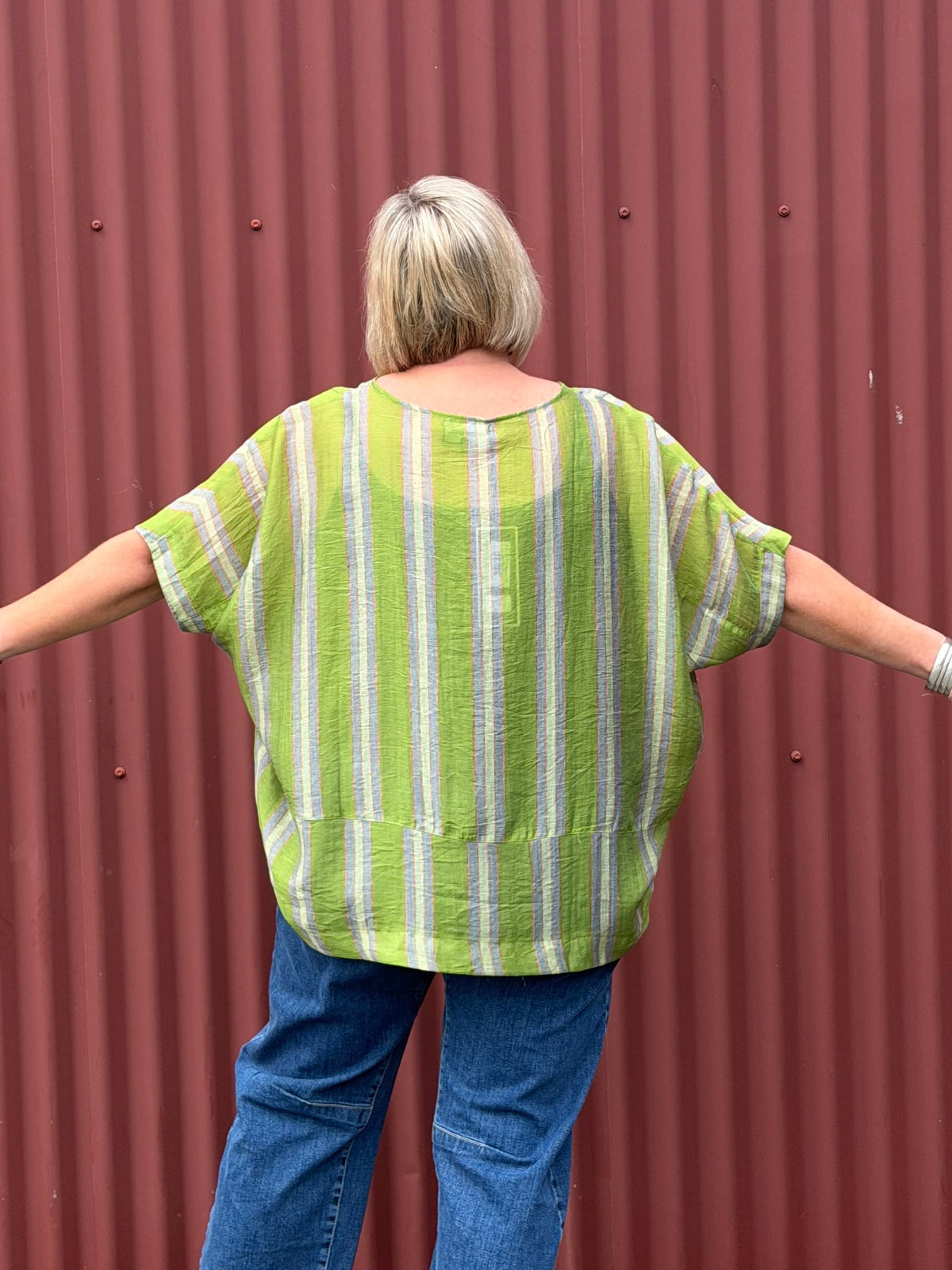 Relaxed and modern with soft sculptural shaping through the body. Featuring an easy oversized fit, clean wide sleeves, curved seam detailing, and subtle back shaping that creates beautiful drape when worn. An effortless everyday piece with understated edge and comfort.
