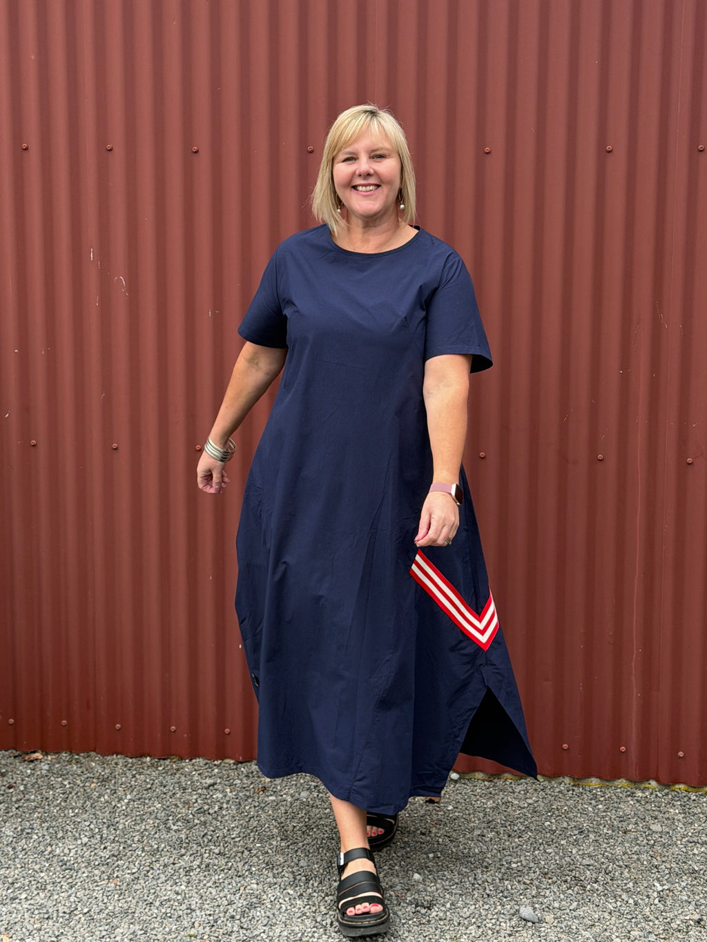 A crisp cotton look with a sporty modern edge, combining clean simplicity with relaxed everyday ease.

Relaxed and sculptural with soft shaping through the body. Featuring angled seam detailing, inset pockets, and subtle cocoon shaping that creates beautiful movement when worn. Finished with soft back elastic adjustable detailing for gentle shape and an effortless everyday feel with edge.
Designed in New Zealand for real women.

Fabric- Cotton