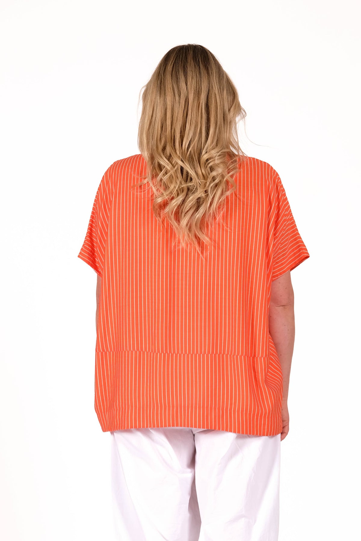 Relaxed and modern top with soft sculptural shaping . Featuring an easy oversized fit, .Designed By Deeanne Hobbs Fabric  – Viscose/Nylon