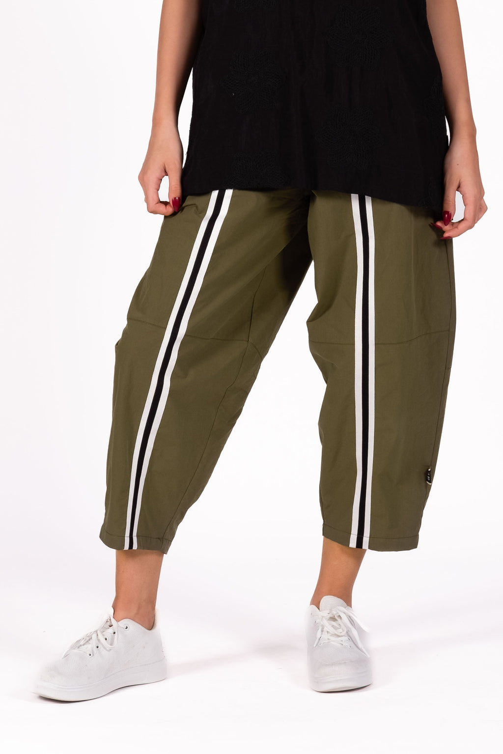 Relaxed and sculptural Pants with a softly tapered silhouette. Featuring statement seam detailing through the leg, and elasticated waistband.By Deeanne Hobbs 