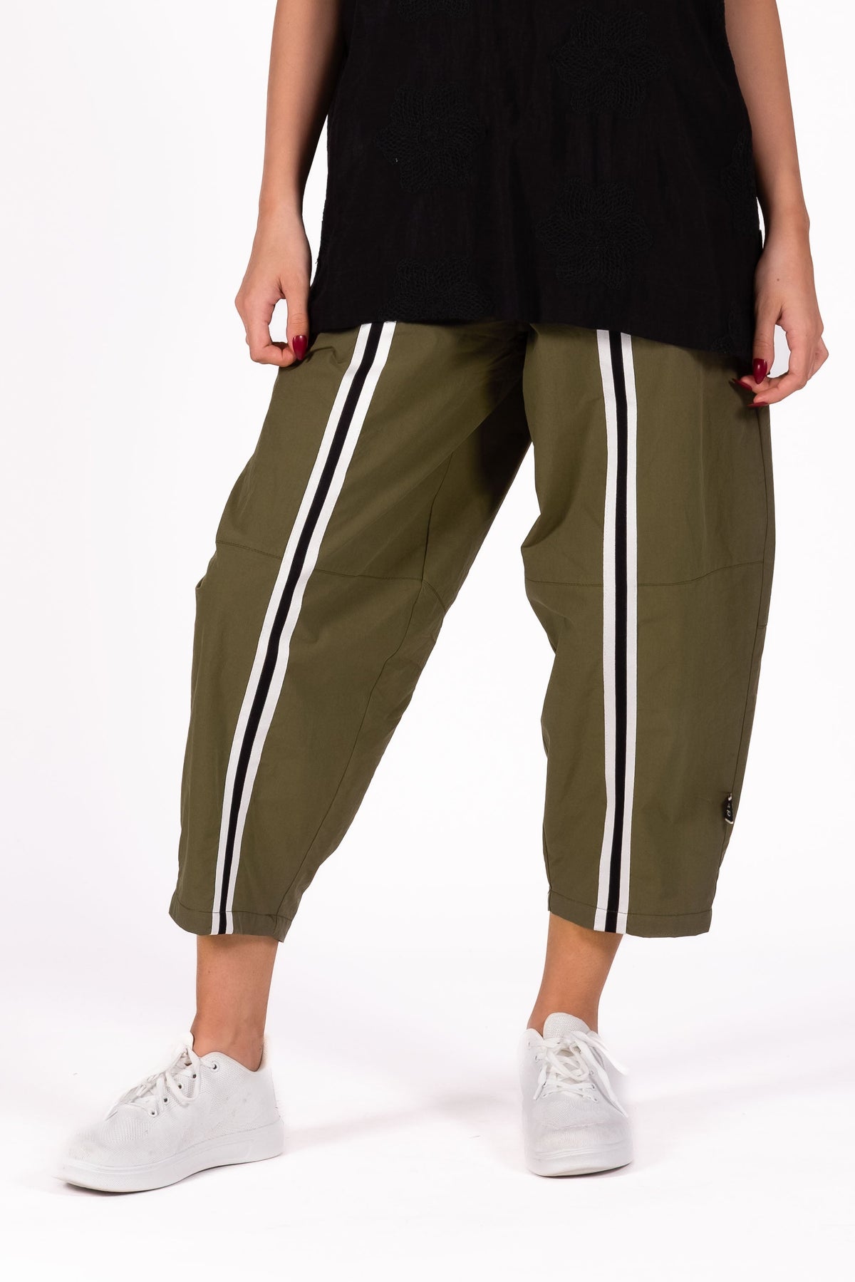 Relaxed and sculptural Pants with a softly tapered silhouette. Featuring statement seam detailing through the leg, and elasticated waistband.By Deeanne Hobbs 