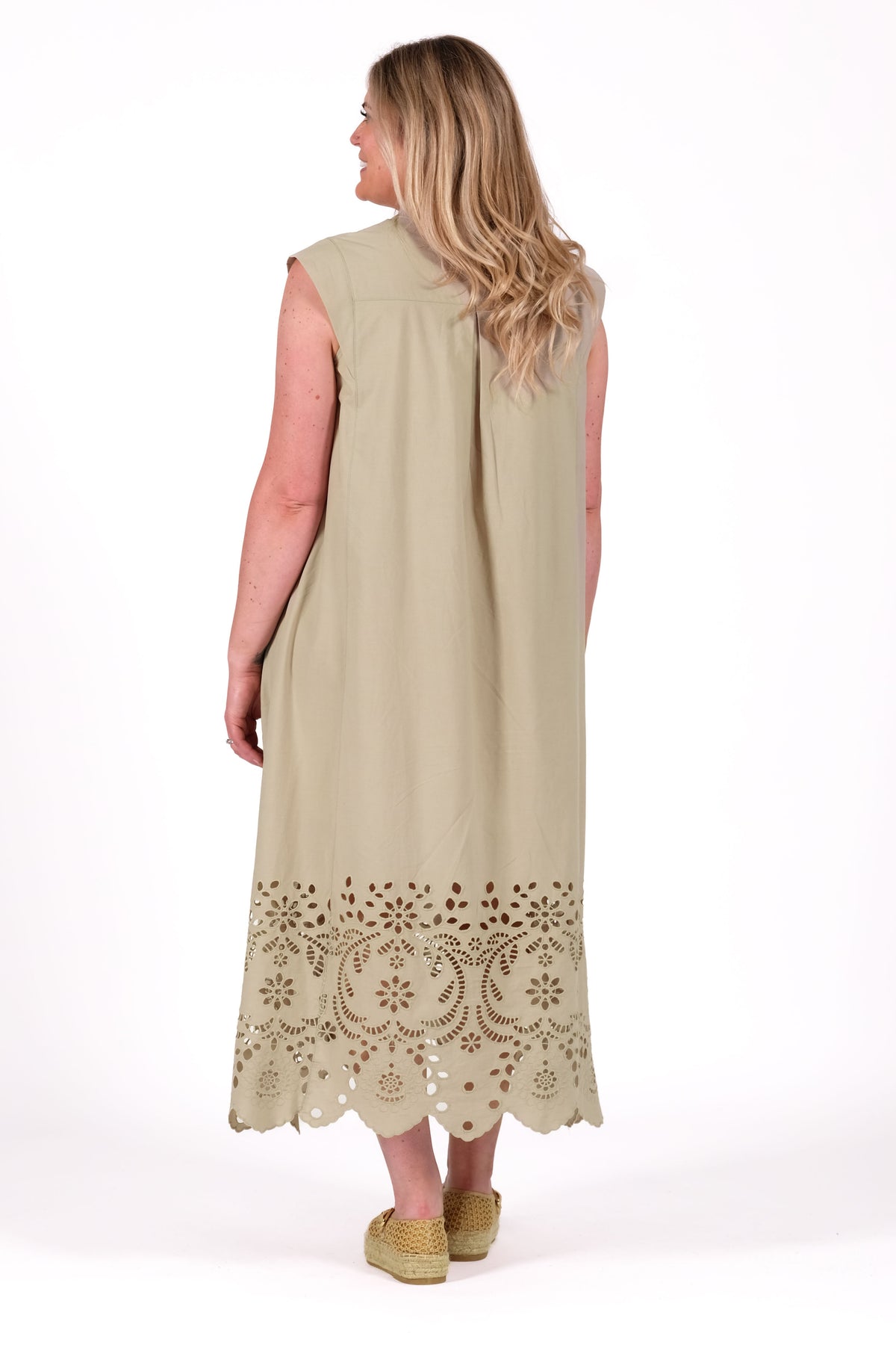 Relaxed with soft architectural shaping throughout. Featuring a clean button placket, subtle pleat detailing through the shoulders and back yoke, and an easy flowing silhouette that moves beautifully when worn. By Deeanne Hobbs 