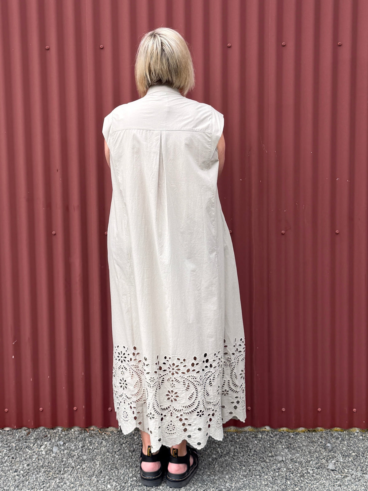 Relaxed with soft architectural shaping throughout. Featuring a clean button placket, subtle pleat detailing through the shoulders and back yoke, and an easy flowing silhouette that moves beautifully when worn. By Deeanne Hobbs 