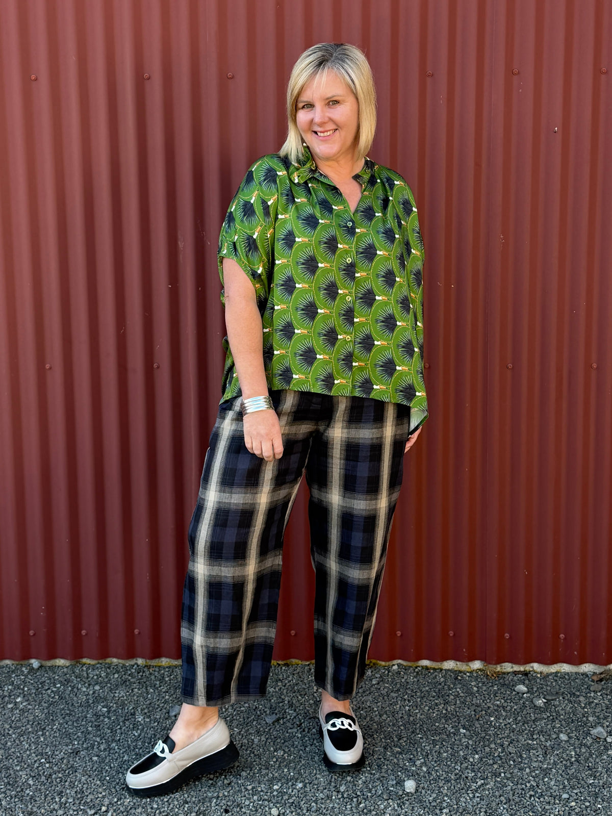 Fluid and elegant, this OBI viscose shirt features a vibrant toucan print, Chinese collar and cape-like sleeves. Oversized fit—size down if preferred.