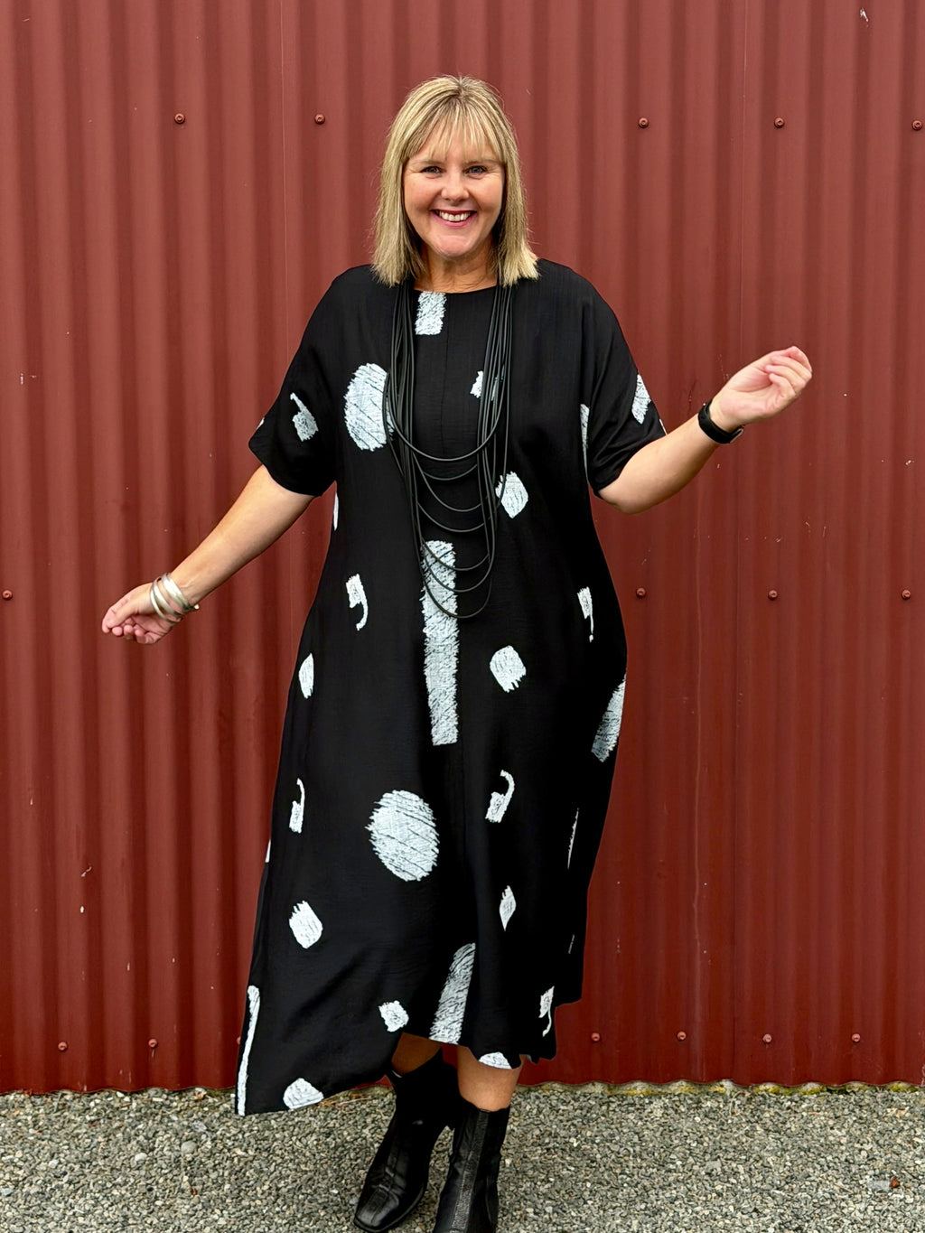 Crafted from a soft, breathable blend of 80% rayon and 20% nylon, it drapes beautifully over the body without clinging. The fabric has a lovely fluid movement