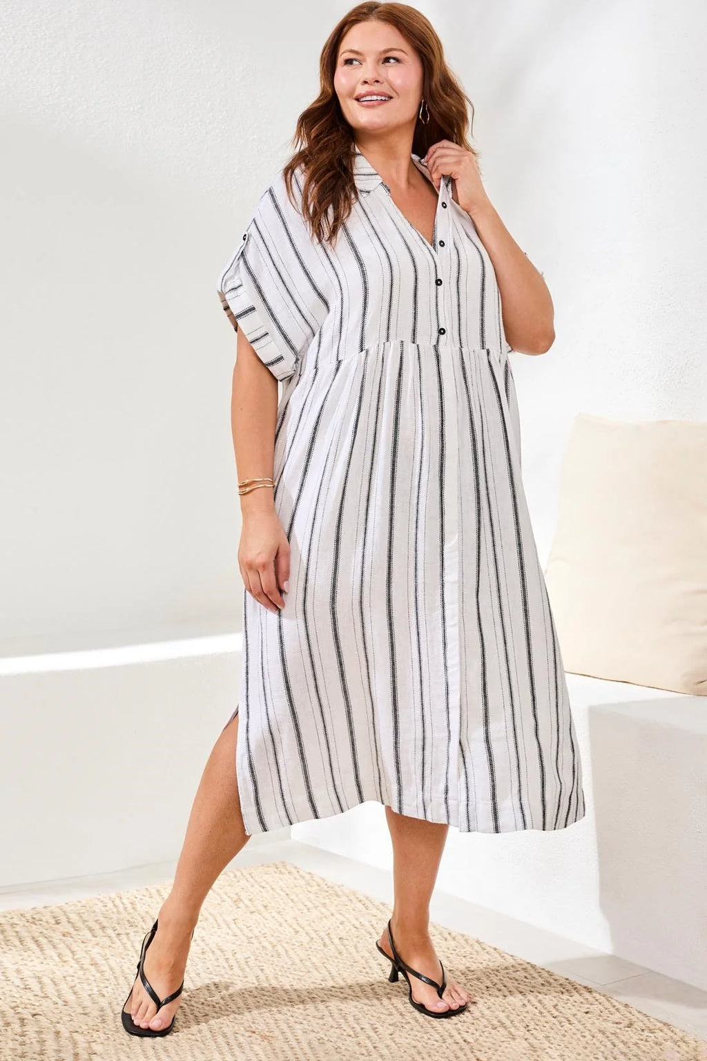 Tribal flowy yarn dye stripe shirt dress, offering the same airy linen-cotton blend, easy drape, and everyday comfort for all body types. Designed for effortless, confidence-boosting style wherever you go.

Fabric 55% Linen 45% Rayon