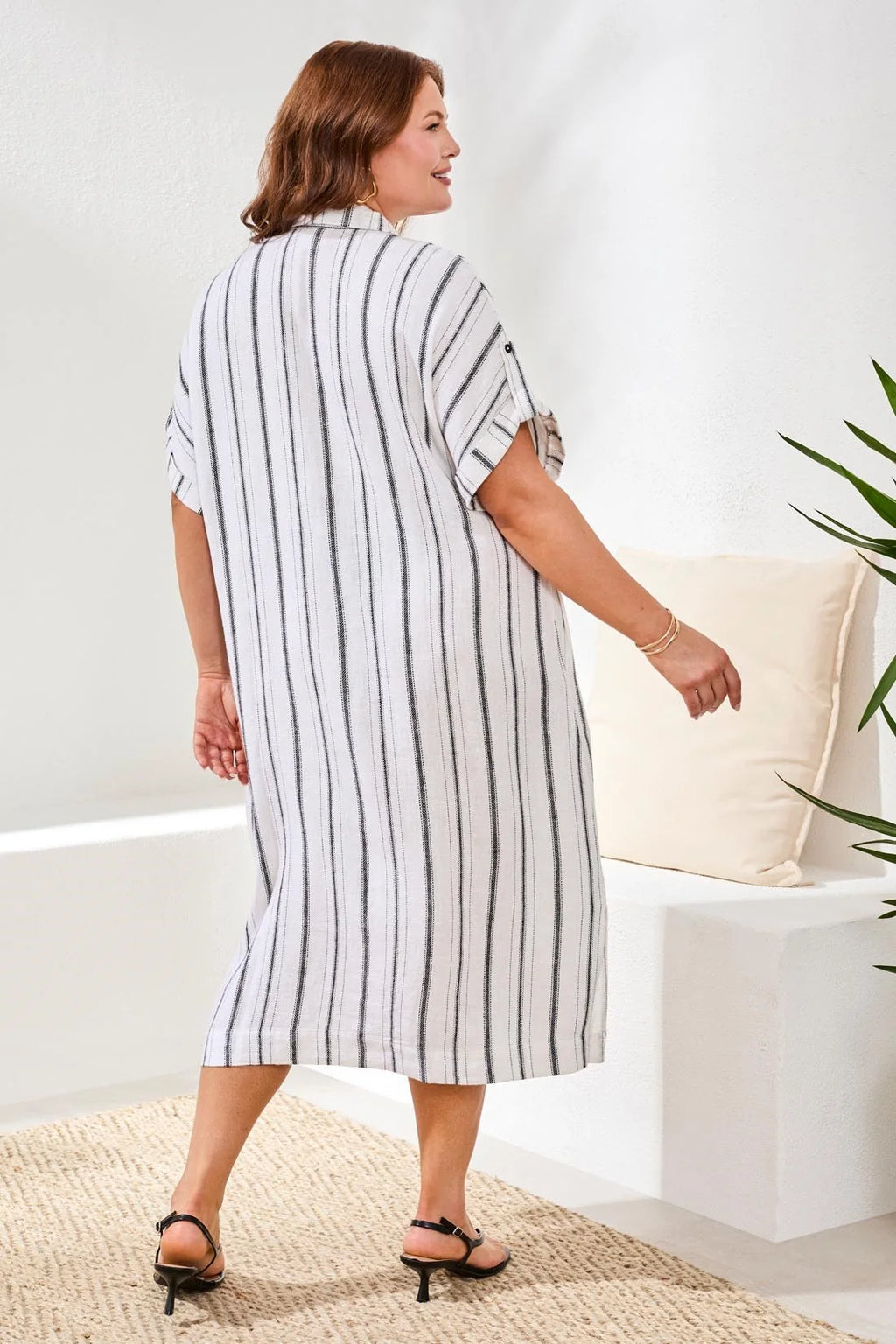 Tribal flowy yarn dye stripe shirt dress, offering the same airy linen-cotton blend, easy drape, and everyday comfort for all body types. Designed for effortless, confidence-boosting style wherever you go.

Fabric 55% Linen 45% Rayon