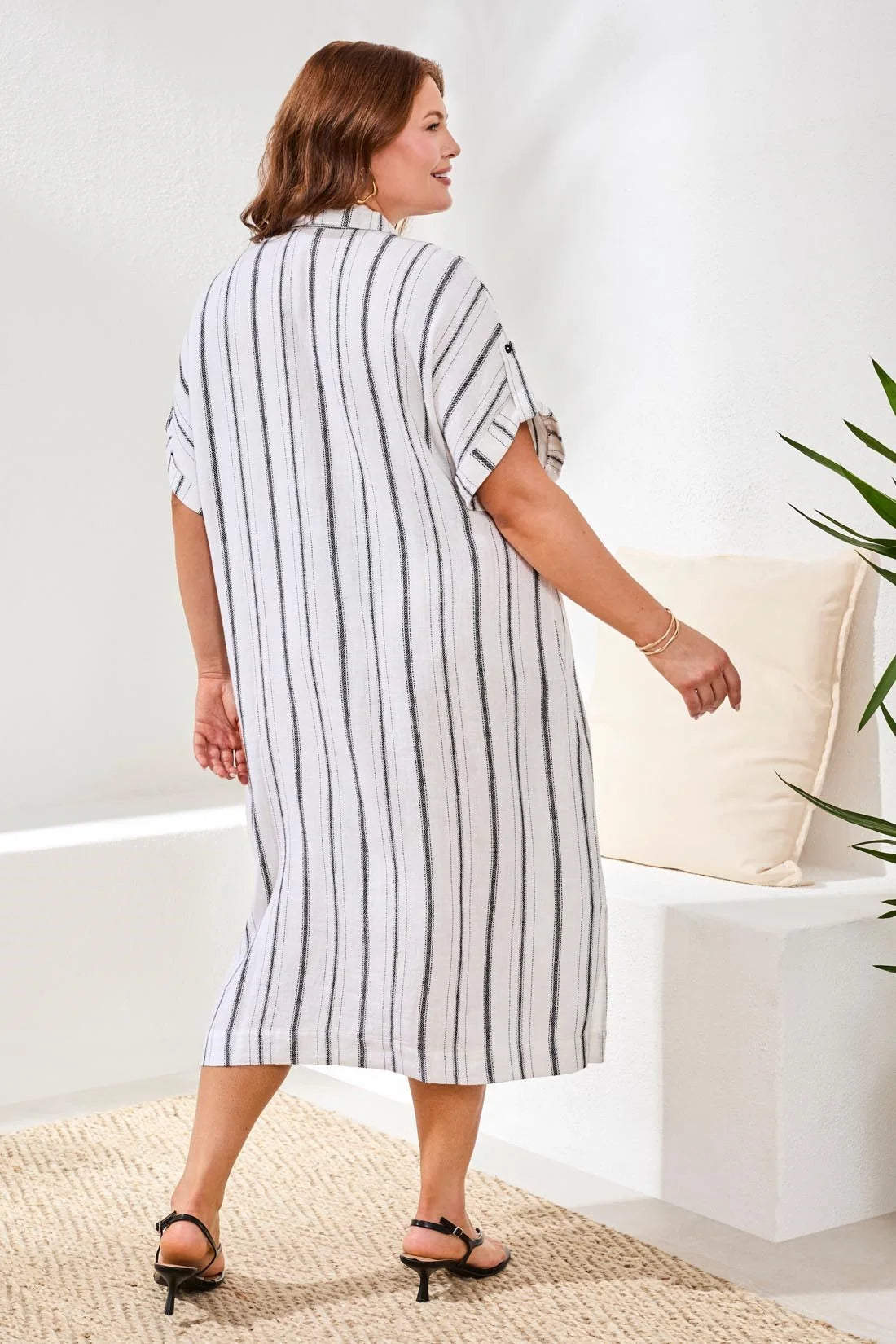 Tribal flowy yarn dye stripe shirt dress, offering the same airy linen-cotton blend, easy drape, and everyday comfort for all body types. Designed for effortless, confidence-boosting style wherever you go.

Fabric 55% Linen 45% Rayon